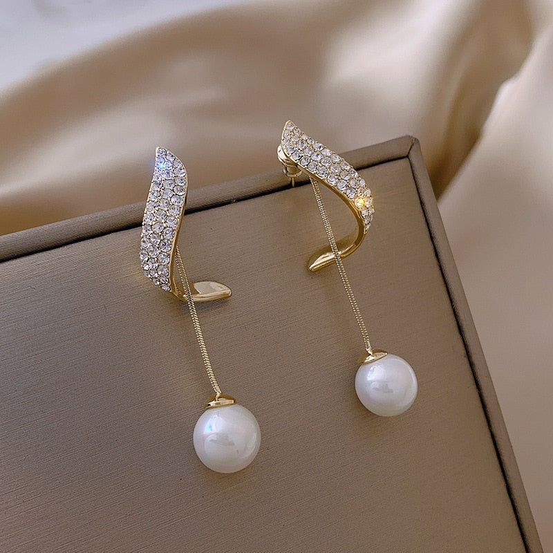 Boucles d'oreilles pendantes en argent 925 avec perles et zircons étincelants