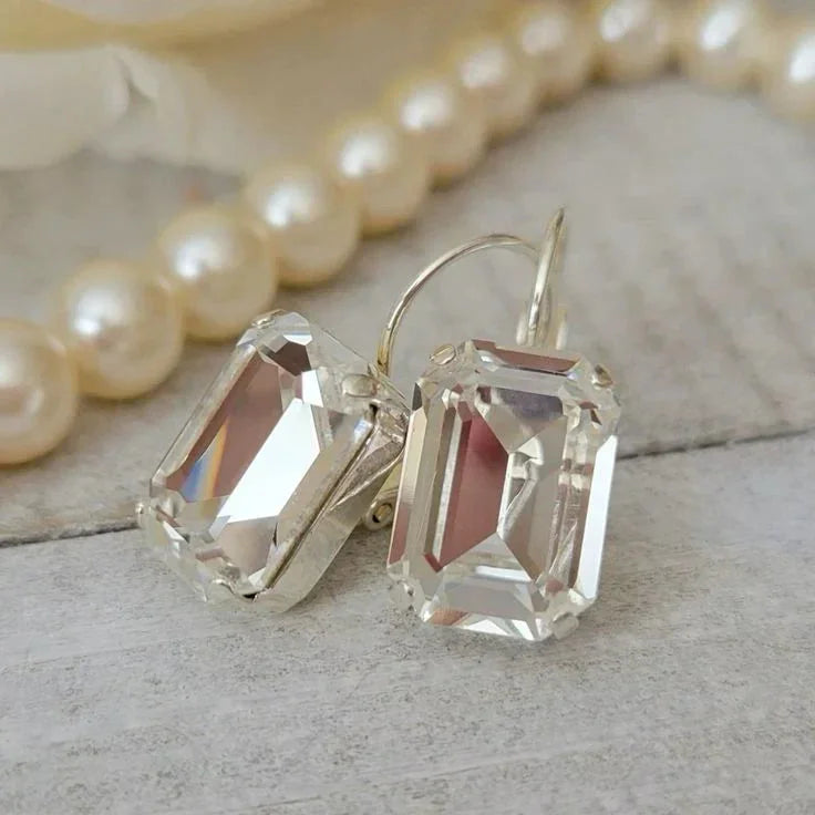 Boucles d'oreilles en verre blanc vintage