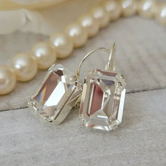 Boucles d'oreilles en verre blanc vintage