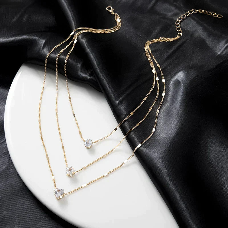 Collier Trois Pendentifs en Zircone Doree