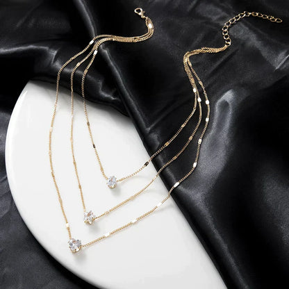Collier Trois Pendentifs en Zircone Doree