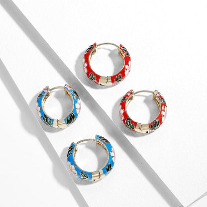 Boucles d’Oreilles Raffinées en Forme de Fleur