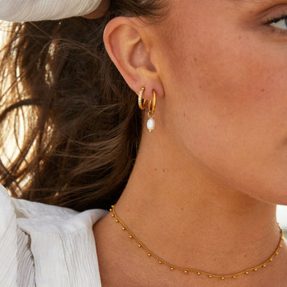 Les Boucles d'Oreilles Créoles en Perles Classiques