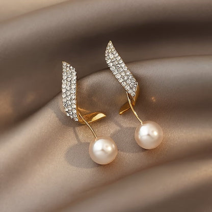 Boucles d'oreilles en perles de cristal et plumes
