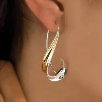 Boucles d'oreilles vintage dorées pendantes