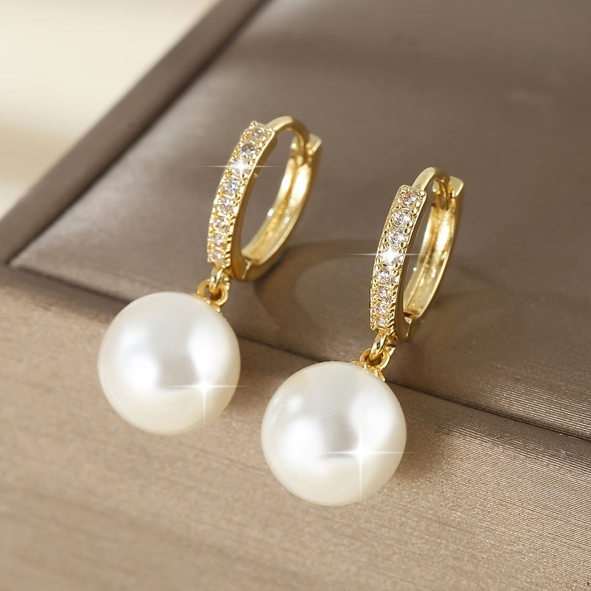 Les Boucles d'Oreilles en Perles Géométriques