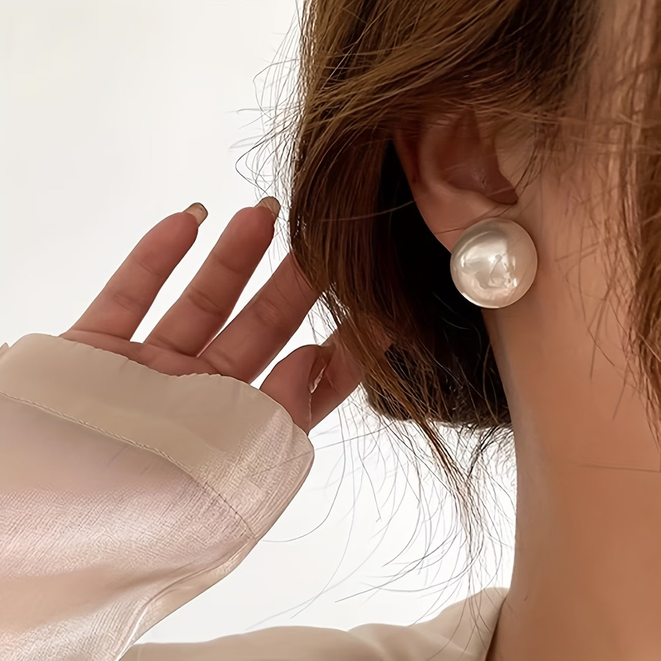Les Boucles d'Oreilles Perle de Caractère