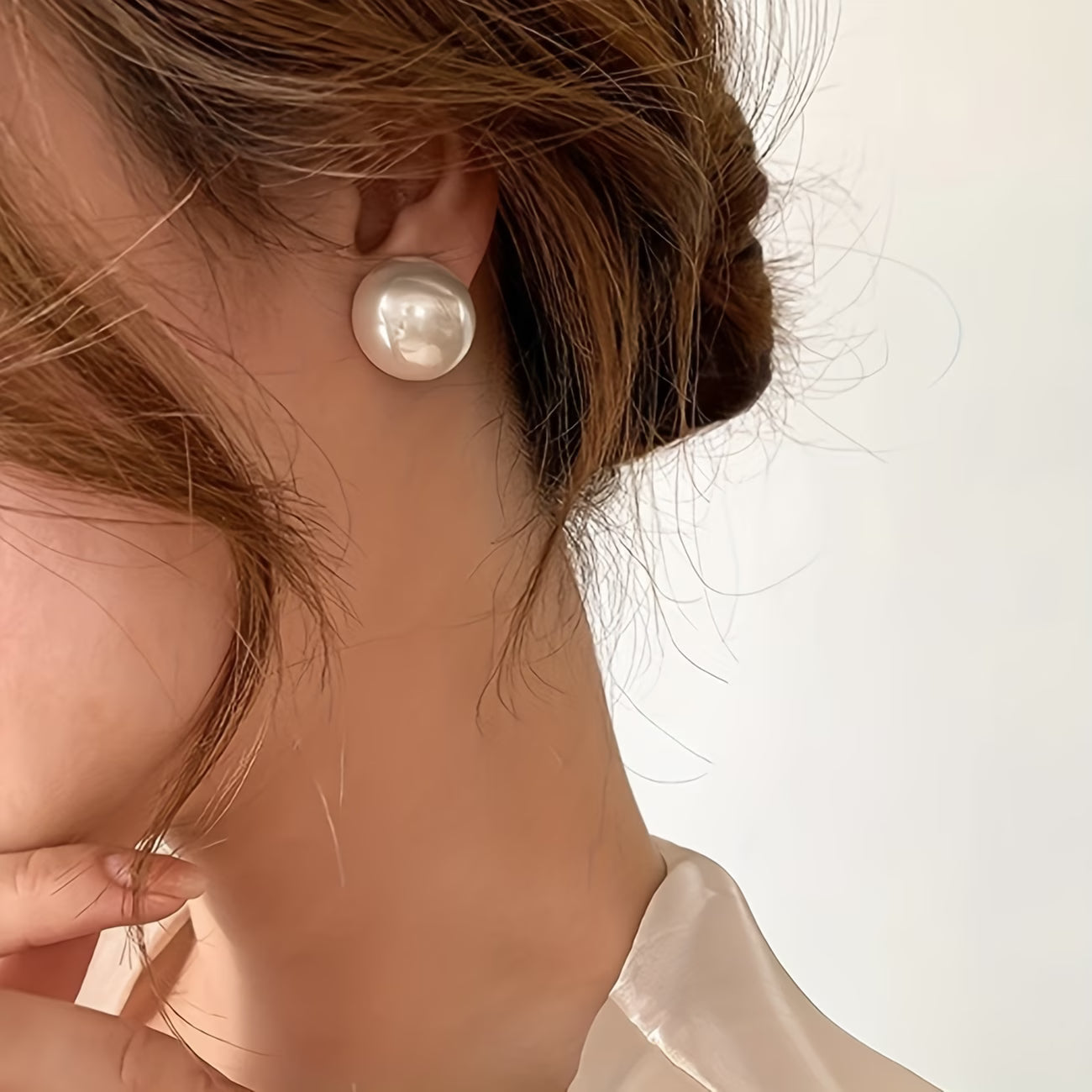 Les Boucles d'Oreilles Perle de Caractère