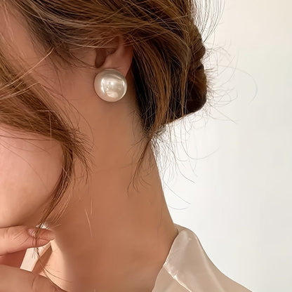 Les Boucles d'Oreilles Perle de Caractère