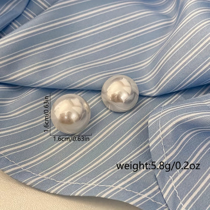 Les Boucles d'Oreilles Perle de Caractère